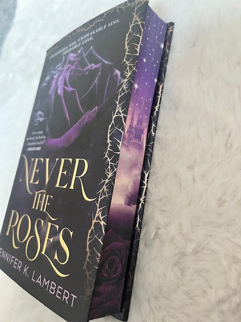 Never The Roses Sprayed Edge Edition